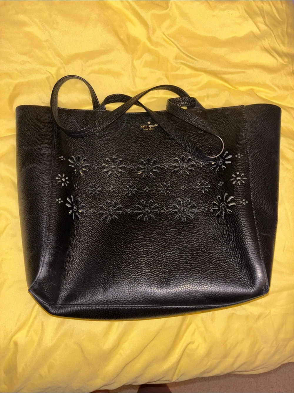 kate spade black leather tote with floral cutouts